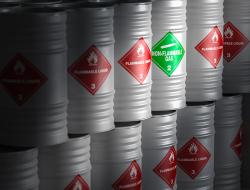 chemical-barrels-with-hazard-signs-red-green