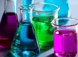 lab-beakers-liquid-pink-blue-green-purple