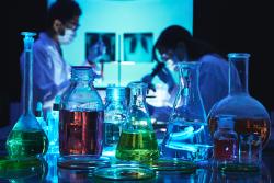 laboratory-technicians-lab-chemicals-dark