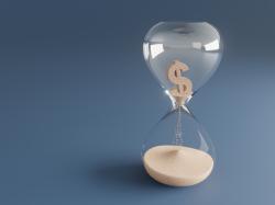 Time and money are running out, hourglass concept image
