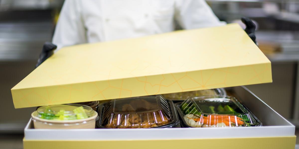 Catering-packaging-yellow-box-chef
