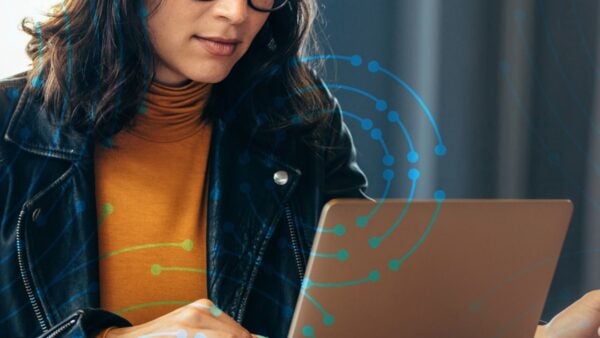 Woman in glasses with laptop