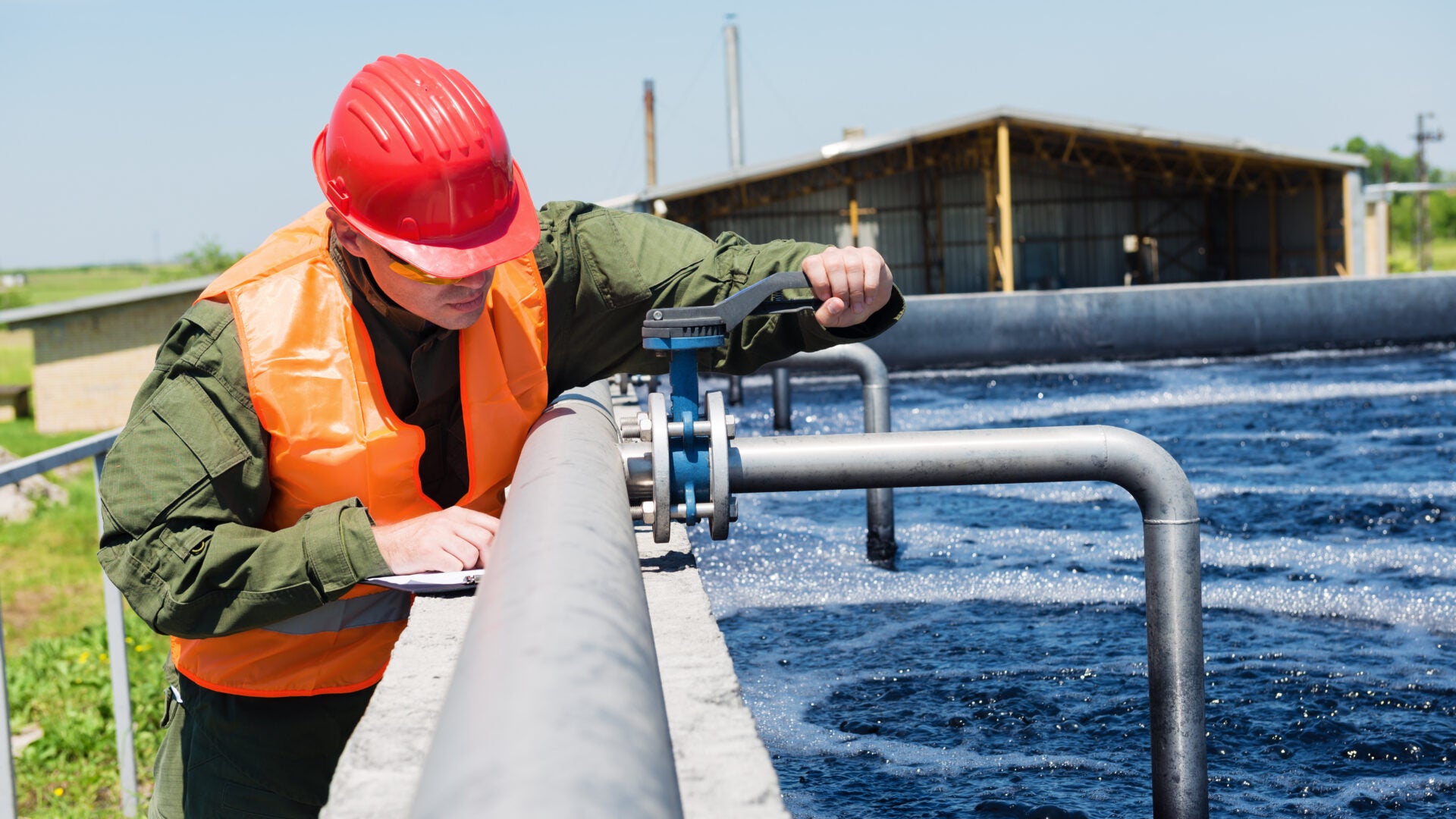 An engineer controlling a quality of water ,aerated activated sl