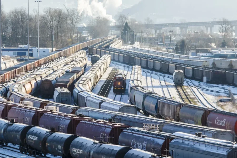 Vancouver, Canada - Circa 2014 : CN Rail Locomotive and mixed freight cars in Train Yard.