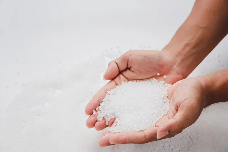 A close-up of plastic pellets which have significant environmental impacts related to microplastic pollution.